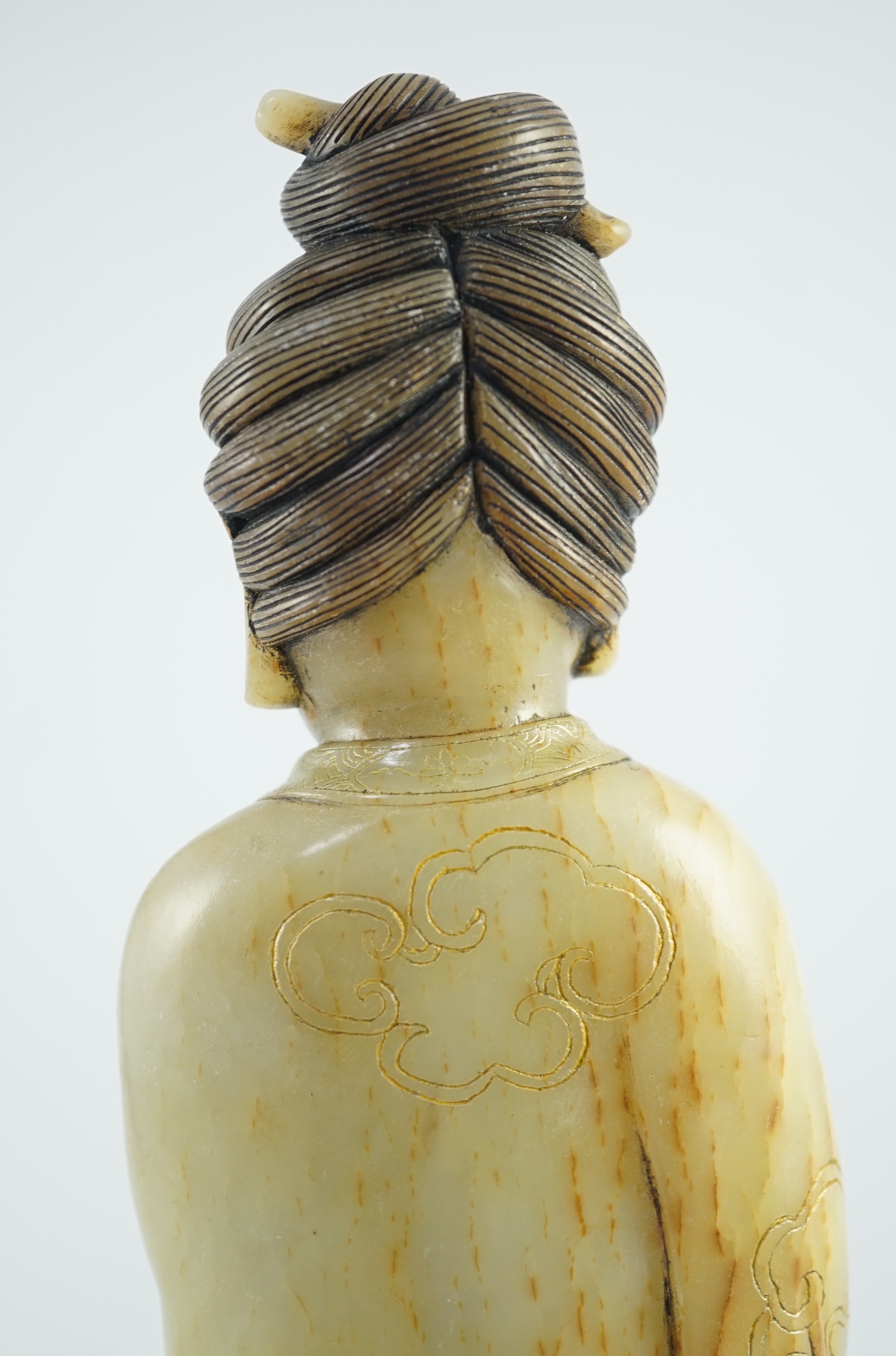 A Chinese soapstone standing figure of Guanyin, 19th century, 38cm high